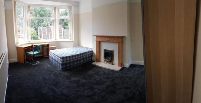 Bright and welcoming living room featuring a la...