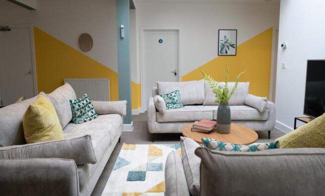 A bright and spacious modern living room, perfe...