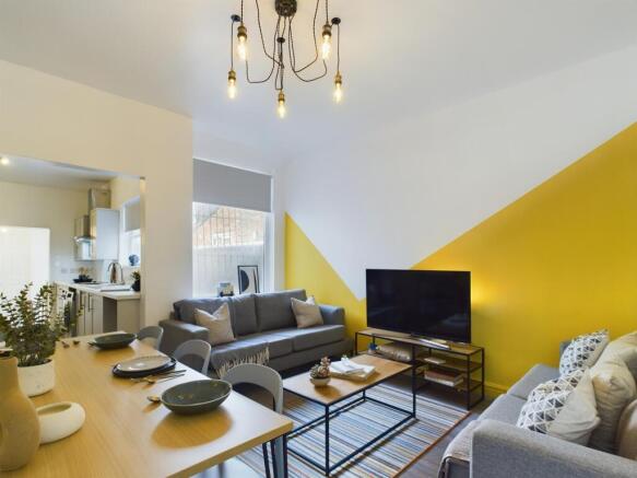 Bright and contemporary living room with stylis...