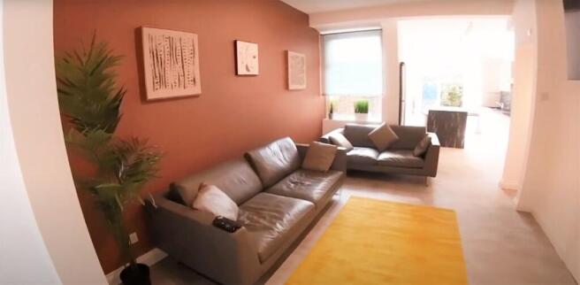 A bright and spacious contemporary living room ...