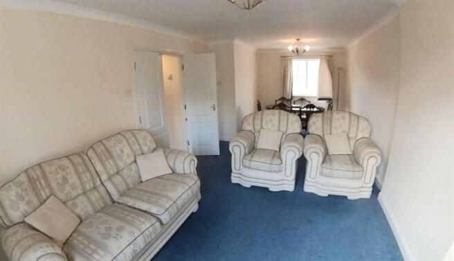 A spacious and inviting living room featuring c...