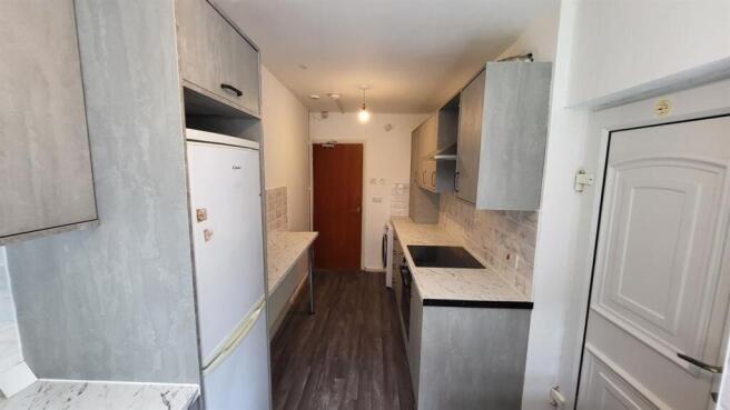 Bright and functional kitchen featuring modern ...