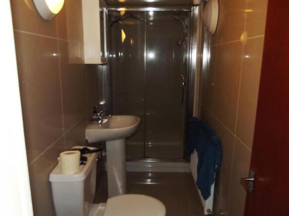 A clean and well-maintained bathroom with a toi...