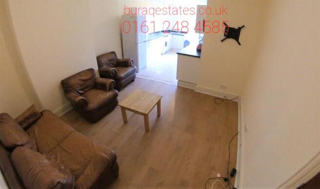 Bright and welcoming living room featuring comf...