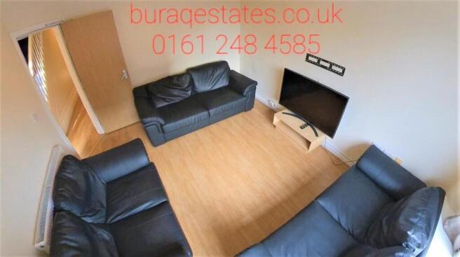 A bright and inviting living room featuring thr...