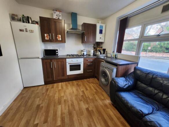 A welcoming living room featuring a comfortable...