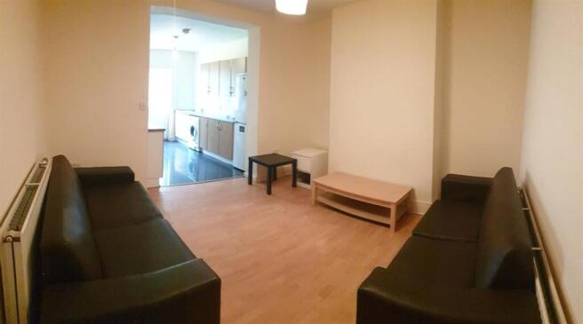 A welcoming and well-maintained living room wit...