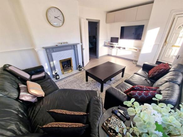 A bright and inviting contemporary living room ...