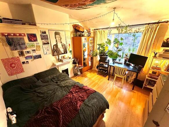Bright, characterful bedroom with a large comfy...