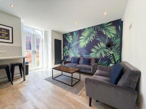 Bright contemporary living room with a bold tro...