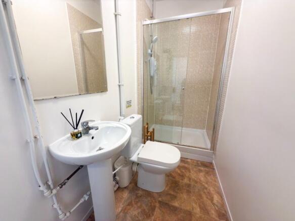 A clean and well-maintained bathroom featuring ...