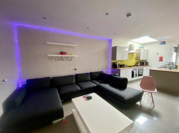 Contemporary open-plan living room with a large...