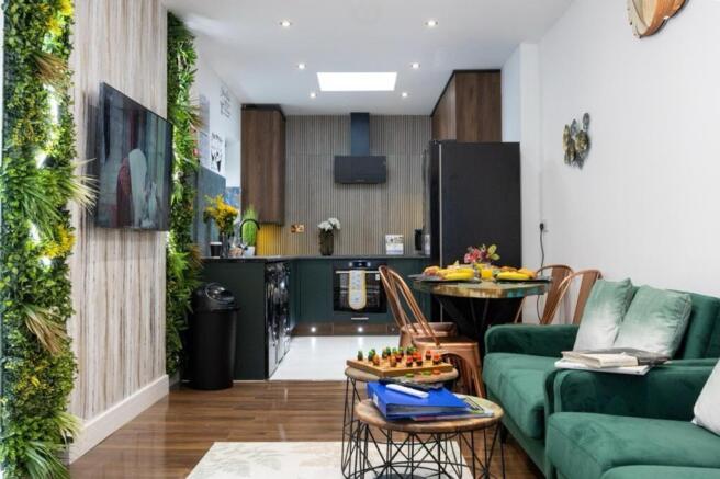 A stylish and inviting living room featuring mo...