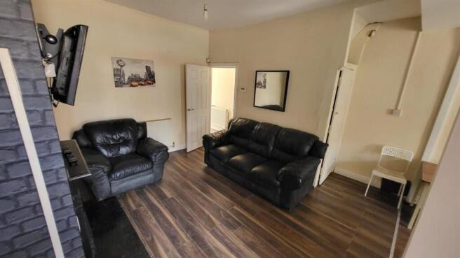 A modern living room featuring two comfortable ...