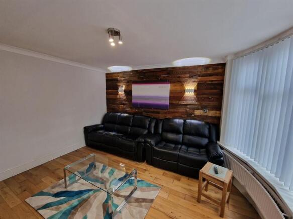 Comfortable contemporary living room with a lea...