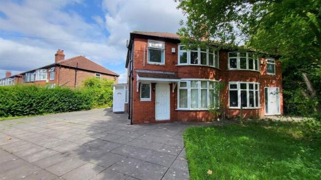 Charming semi-detached brick house featuring a ...