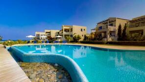 Photo of Aphrodite Beachfront Apartment, Pyrgos Psilonerou