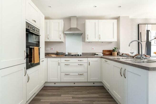 A modern fully fitted kitchen makes meal preparation easy