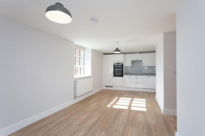 Open plan kitchen - dining - living