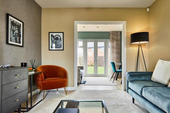 Move effortlessly between the living and dining/kitchen through double doors