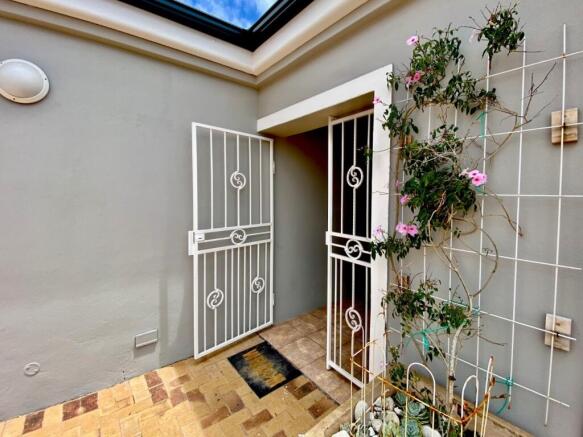 Security gate before front door entrance