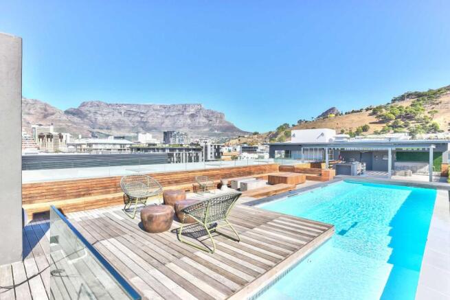 roof terrace entertainment area with pool