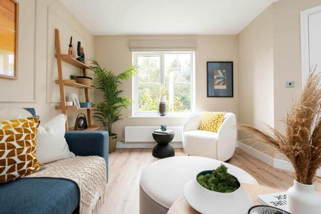 The window to the front floods the living room with light