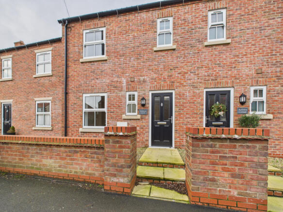 A modern three bedroom mid terrace house - To Let