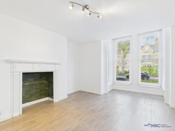 Modern First Floor Apartment with Private Parking