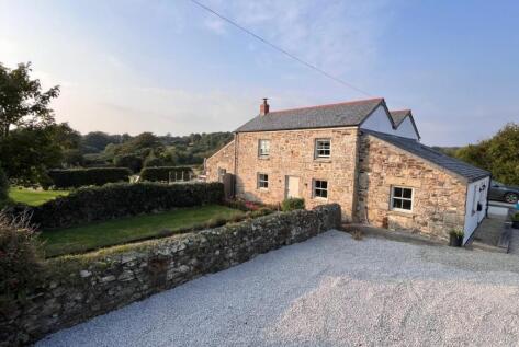 Stunning home, 10 acres and barns with planning permission.
