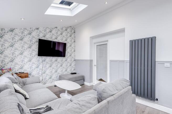 Open plan kitchen diner with seating area