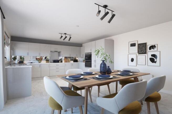 The kitchen benefits from ample storage
