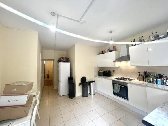 Spacious 7-Bedroom House with Garden in Prime Cla