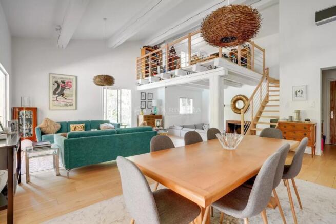 Dining room High ceiling Wooden floor
