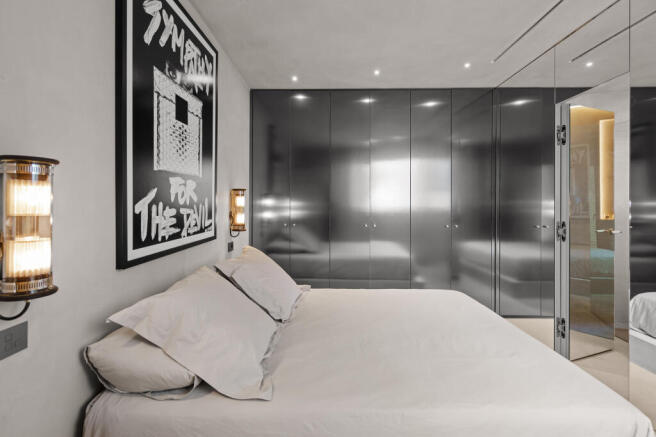 Titanium dressed wardrobes in master bedroom