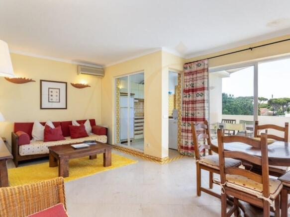 Living and dining room with balcony