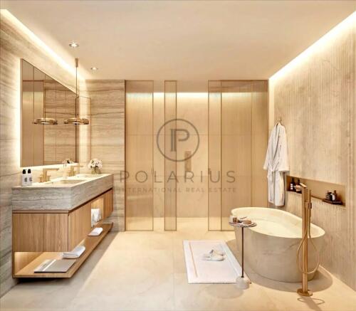 A luxurious, modern bathroom featuring a freestand