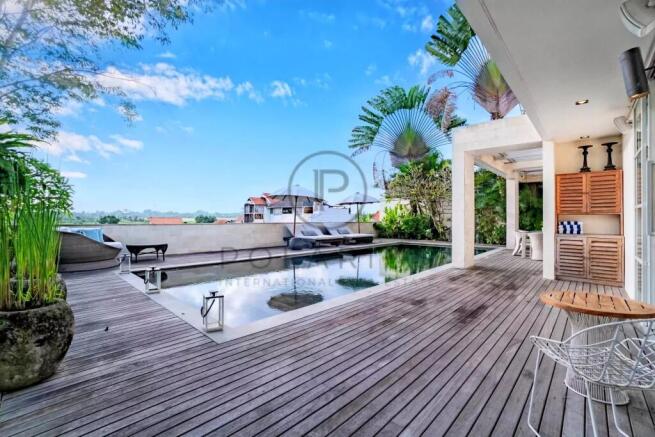 Luxurious outdoor pool area with wooden decking, m