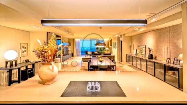 A modern, well-lit living space featuring a sleek 