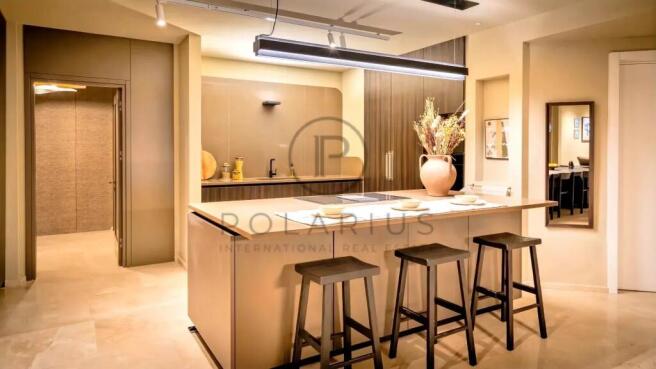 A modern kitchen interior featuring a central isla