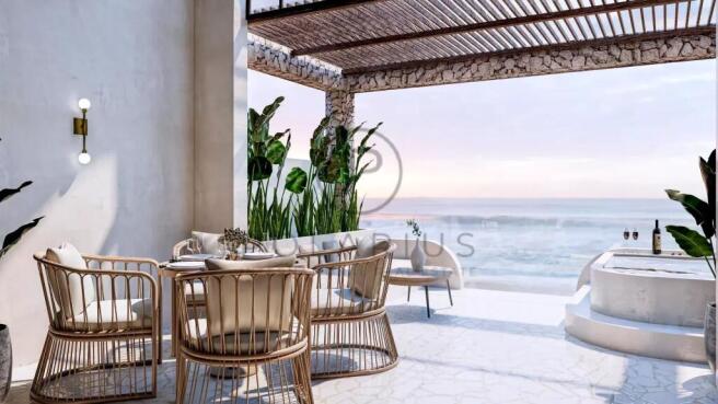 A serene outdoor patio features wicker furniture a