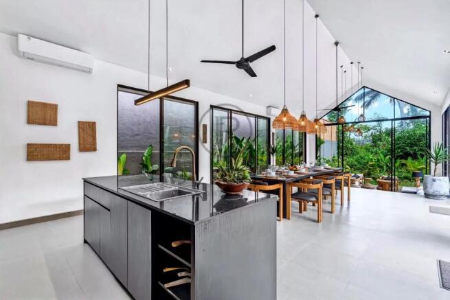 Modern kitchen and dining area with an island, hig
