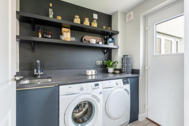 Utility room in detached 4 bedroom home