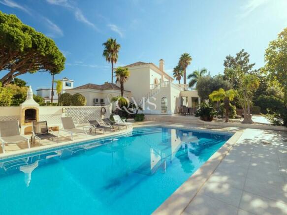 Private Pool and Sun Terrace Surrounded by Lush Gardens