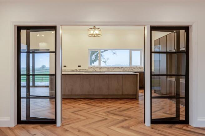 Entrance hall leading to open plan kitchen living