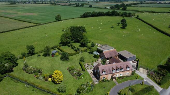 Elevated Front, Garden and Field