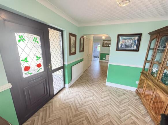 Recessed front entrance door to: