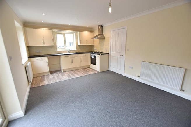 LIVING ROOM WITH OPEN PLAN KITCHEN AREA