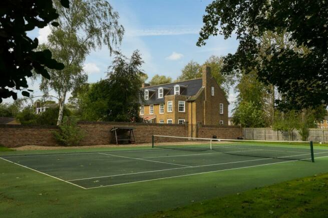 House and tennis court garden