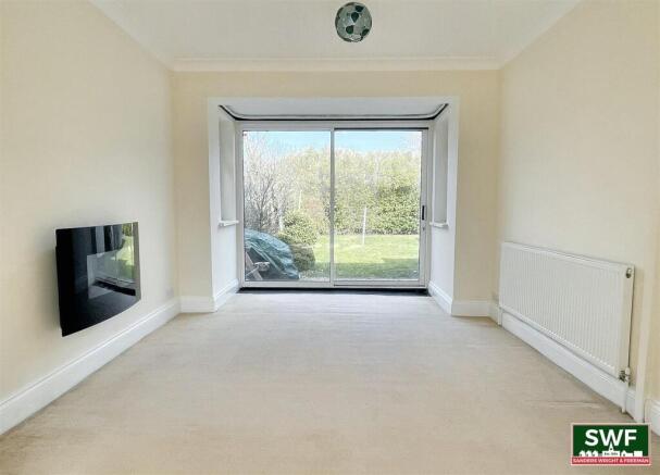 THROUGH LOUNGE/DINING ROOM